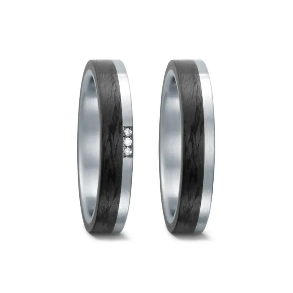 Alianzas de boda de acero y carbono con diamantes