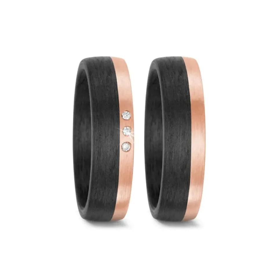 Alianzas de boda de carbono y oro rosado con diamantes