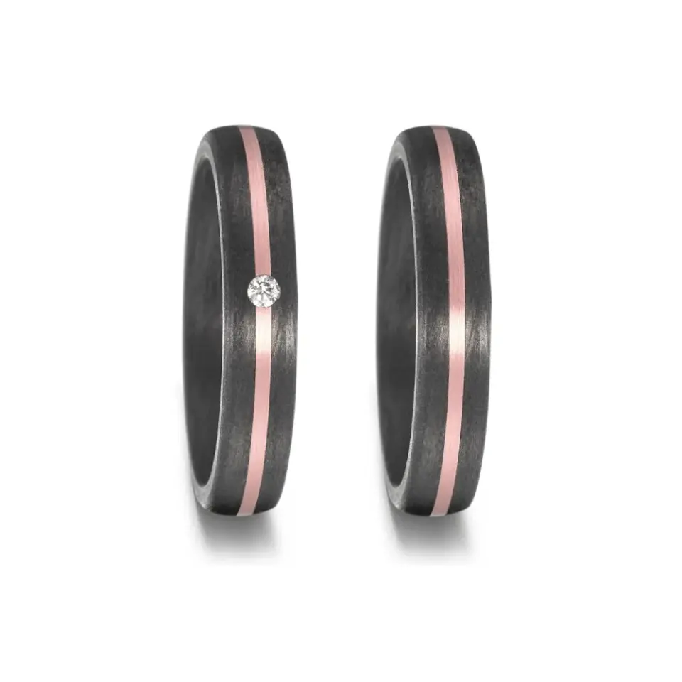 Alianzas de boda de carbono y oro rosado con diamante
