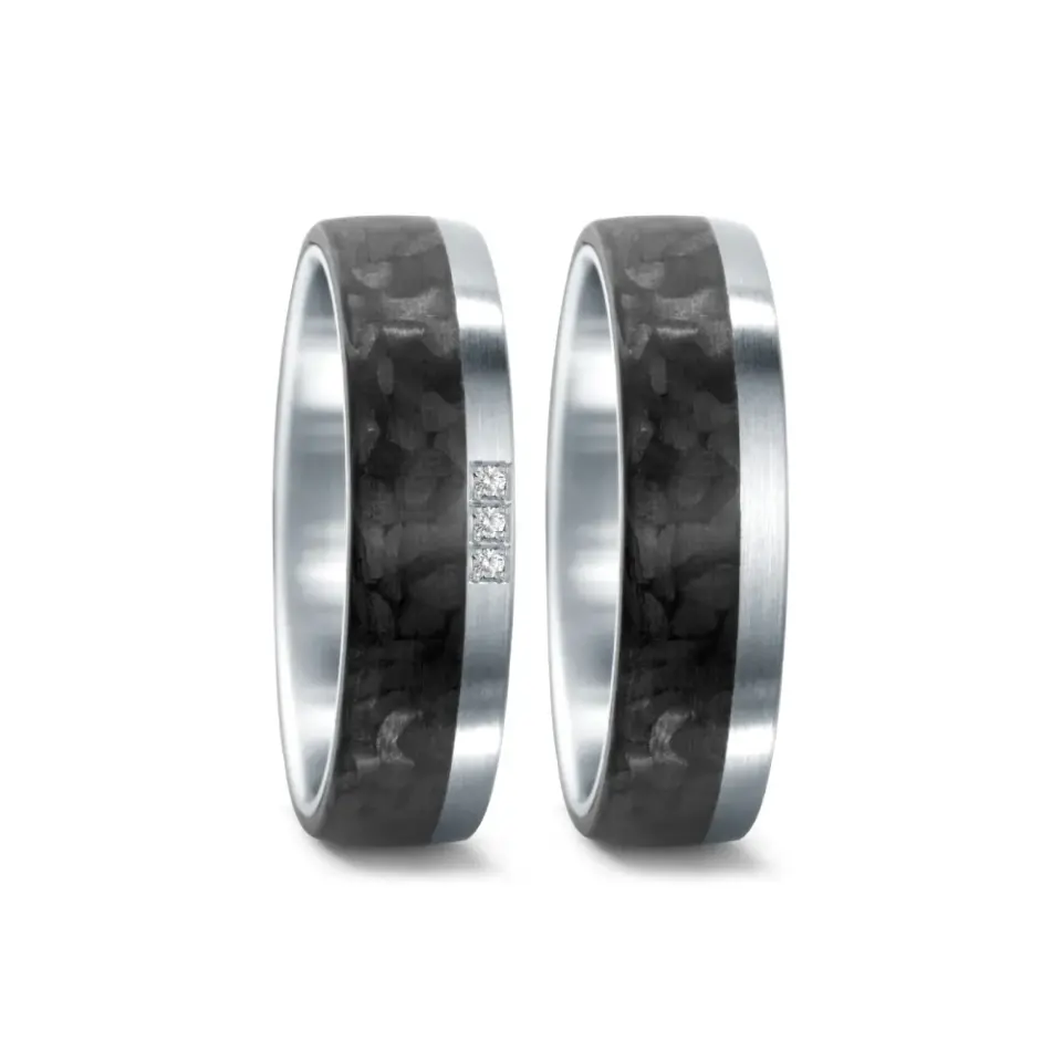 Alianzas de boda de acero y carbono con diamantes