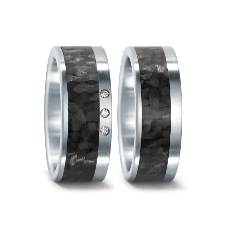 Alianzas de boda de acero y carbono con diamantes