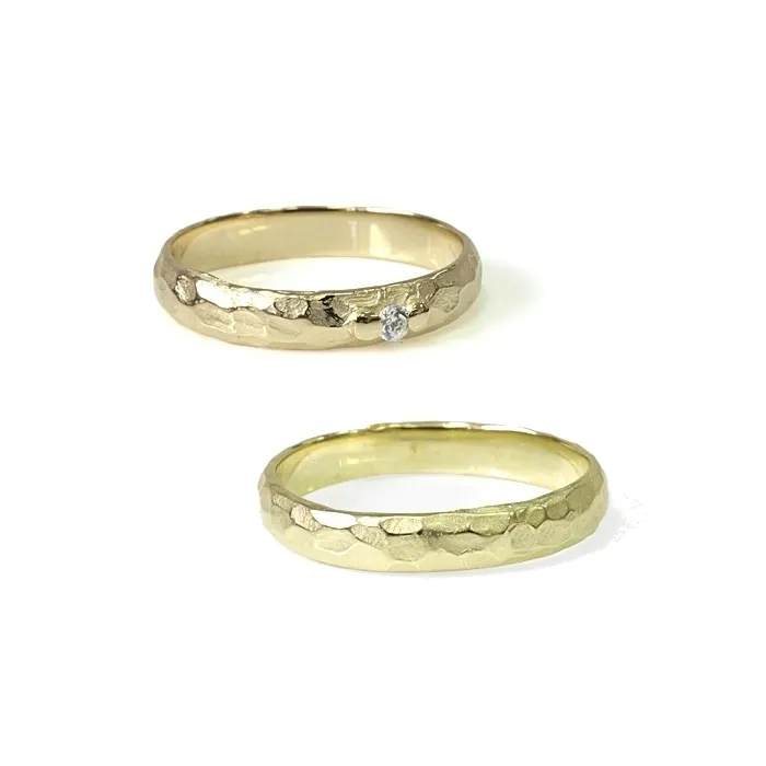 Alianzas de boda de oro amarillo con diamante