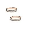 Alianzas de boda de oro rosado y oro blanco con diamante