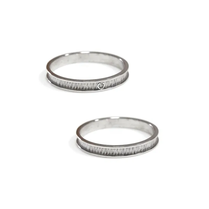 Alianzas de boda de oro blanco con diamante
