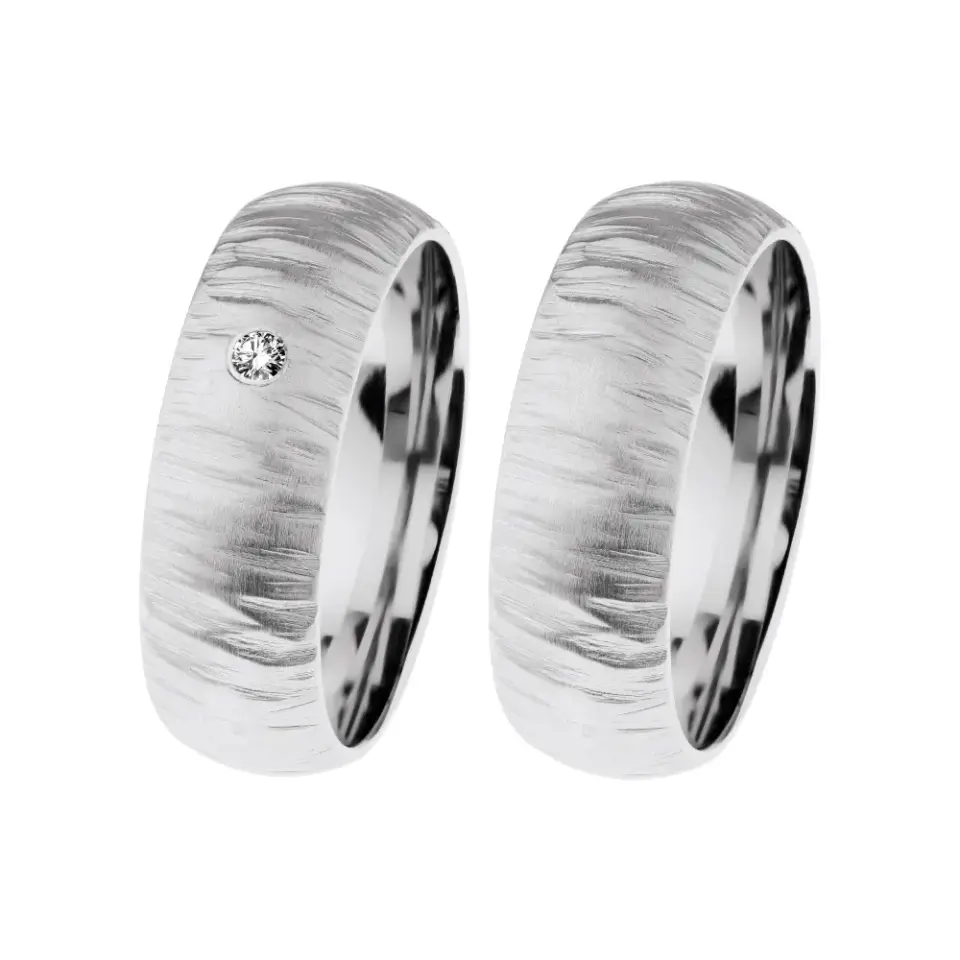 Alianzas de boda de acero con diamante