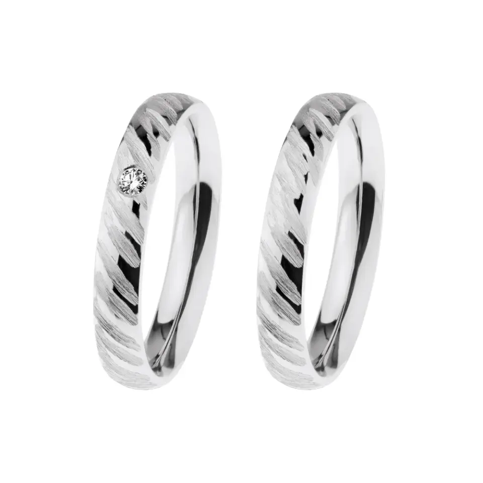 Alianzas de boda de acero con diamante
