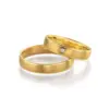 Alianzas de boda de oro amarillo con diamante