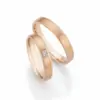 Alianzas de boda de oro champagne con diamante