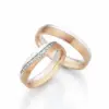 Alianzas de boda de oro champagne y platino con diamantes