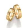 Alianzas de boda de oro amarillo con diamantes