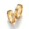 Alianzas de boda de oro amarillo con diamantes