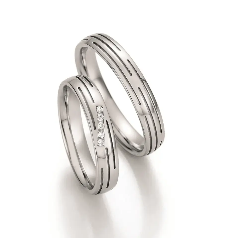 Alianzas de boda de paladio con diamantes