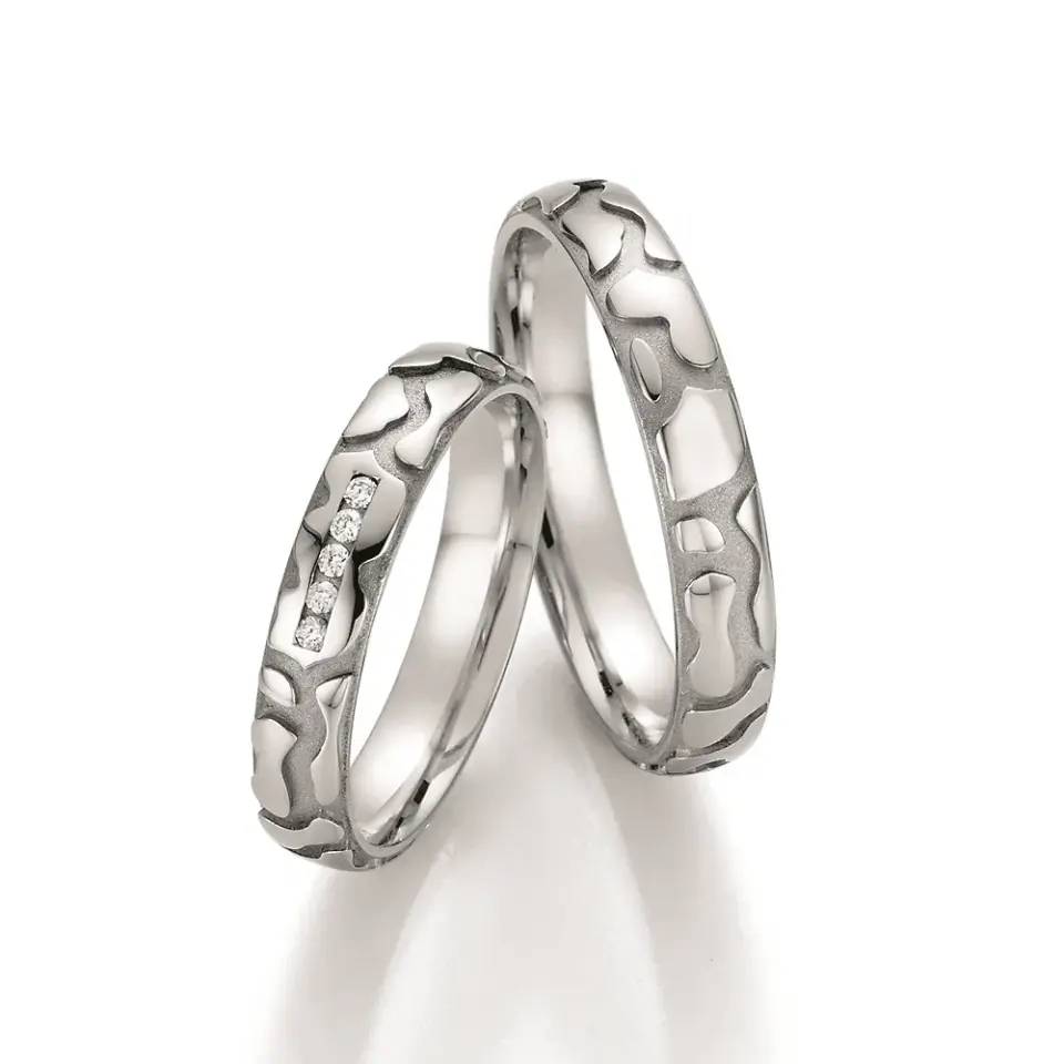 Alianzas de boda de paladio con diamantes