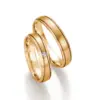 Alianzas de boda de oro amarillo con diamante