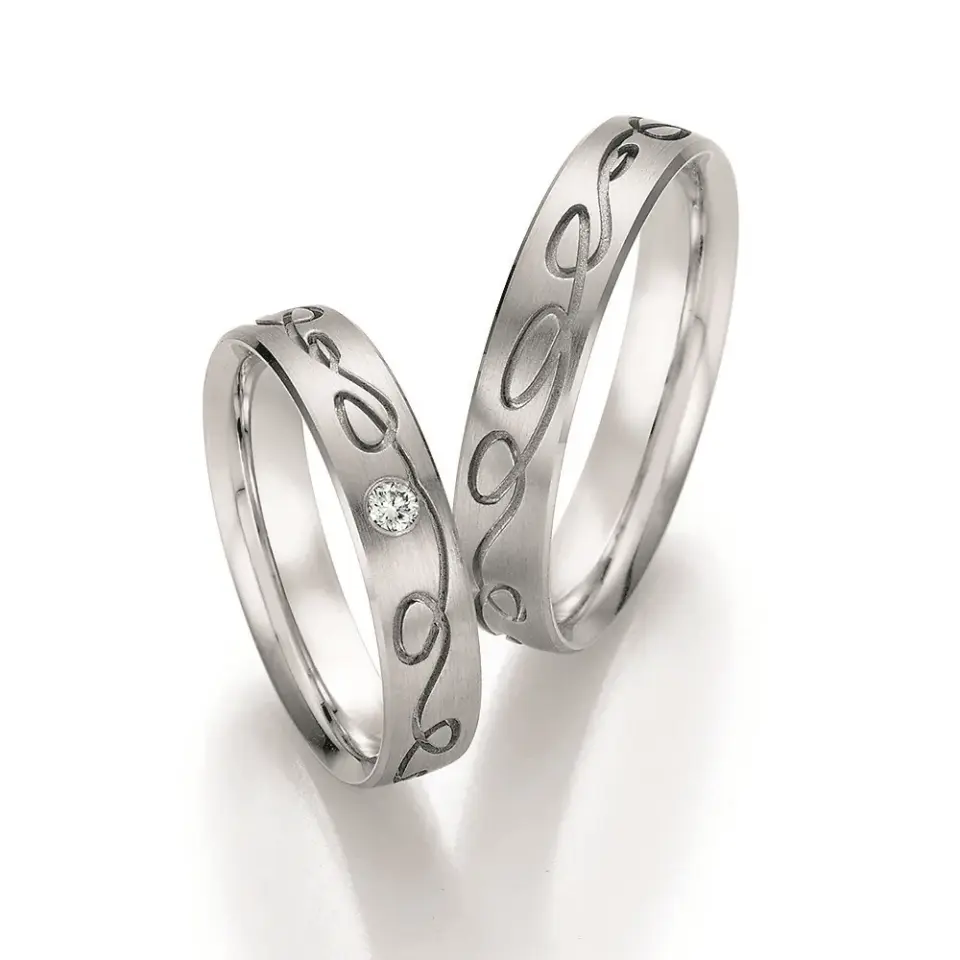 Alianzas de boda de paladio con diamante