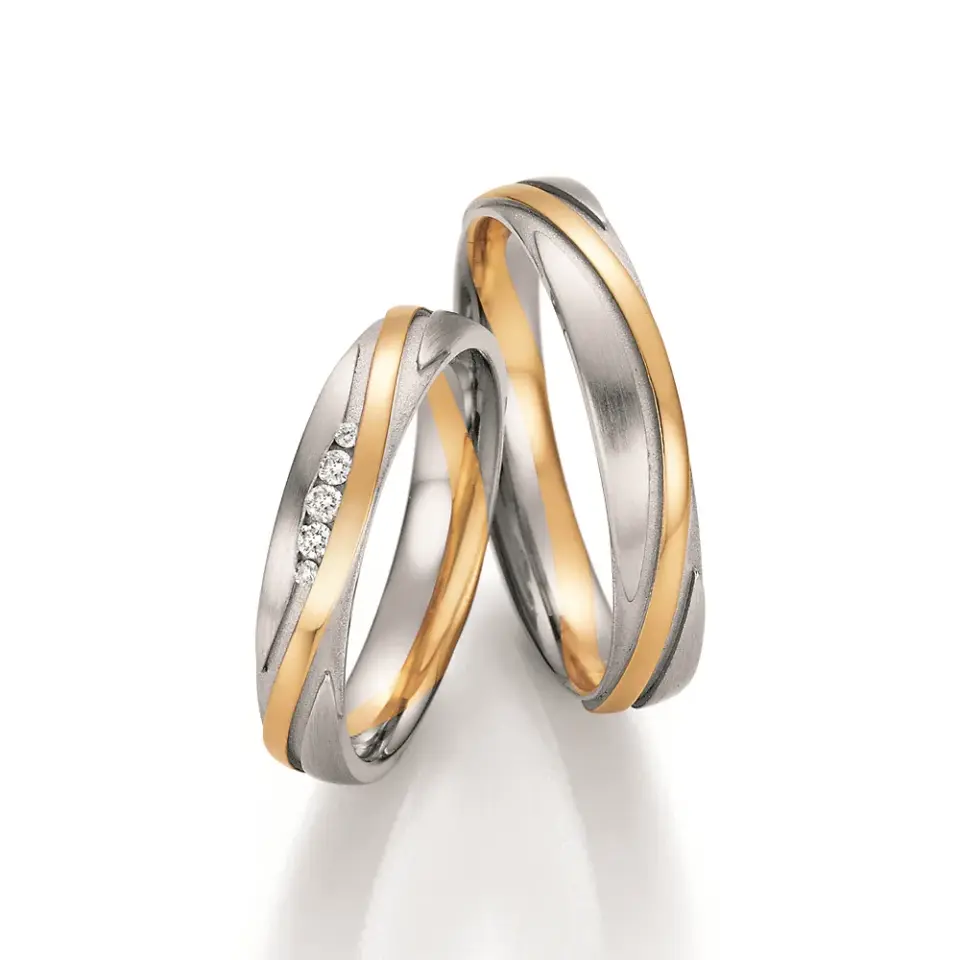 Alianzas de boda de oro blanco y oro amarillo con diamantes