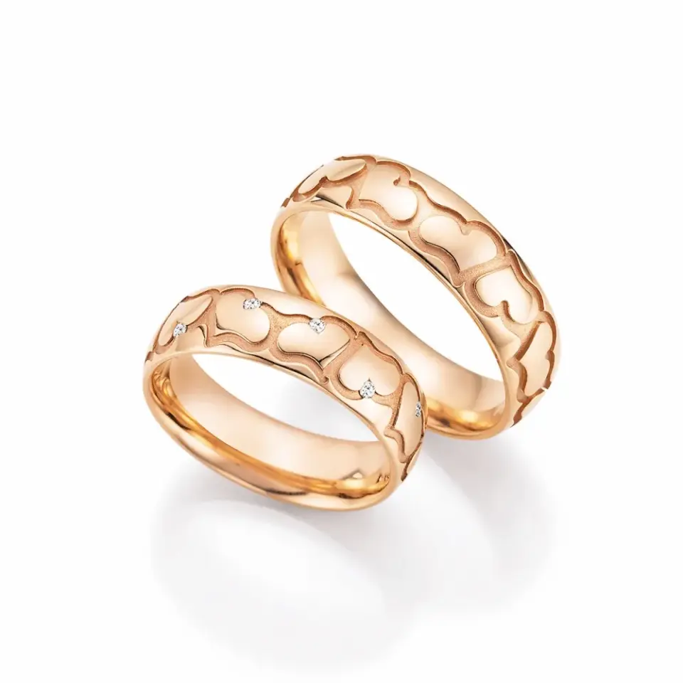 Alianzas de boda de oro rosado con diamantes