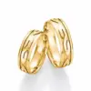 Alianzas de boda de oro amarillo
