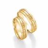 Alianzas de boda de oro amarillo