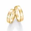 Alianzas de boda de oro amarillo con diamantes