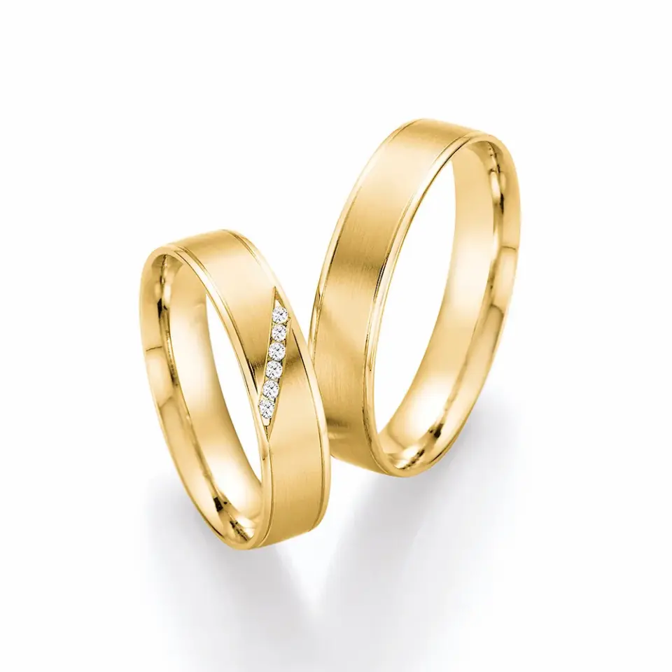 Alianzas de boda de oro amarillo con diamantes