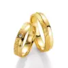 Alianzas de boda de oro amarillo con diamante