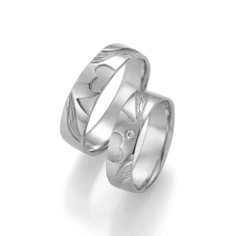Alianzas de boda de plata con diamante
