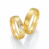 Alianzas de boda de oro amarillo con diamantes