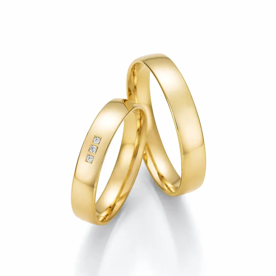 Alianzas de boda de oro amarillo con diamantes