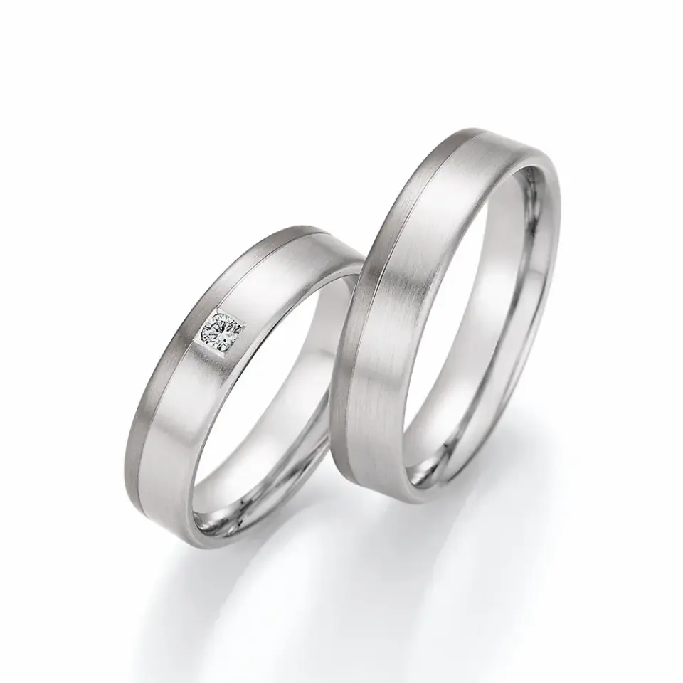 Alianzas de boda de oro blanco y paladio con diamante