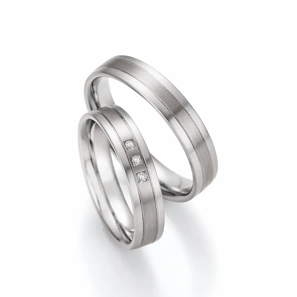 Alianzas de boda de oro blanco y paladio con diamantes