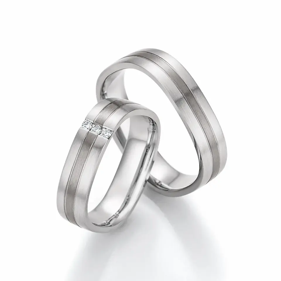 Alianzas de boda de oro blanco y paladio con diamantes