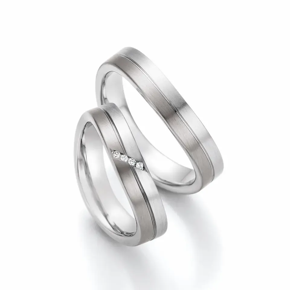 Alianzas de boda de oro blanco y paladio con diamantes