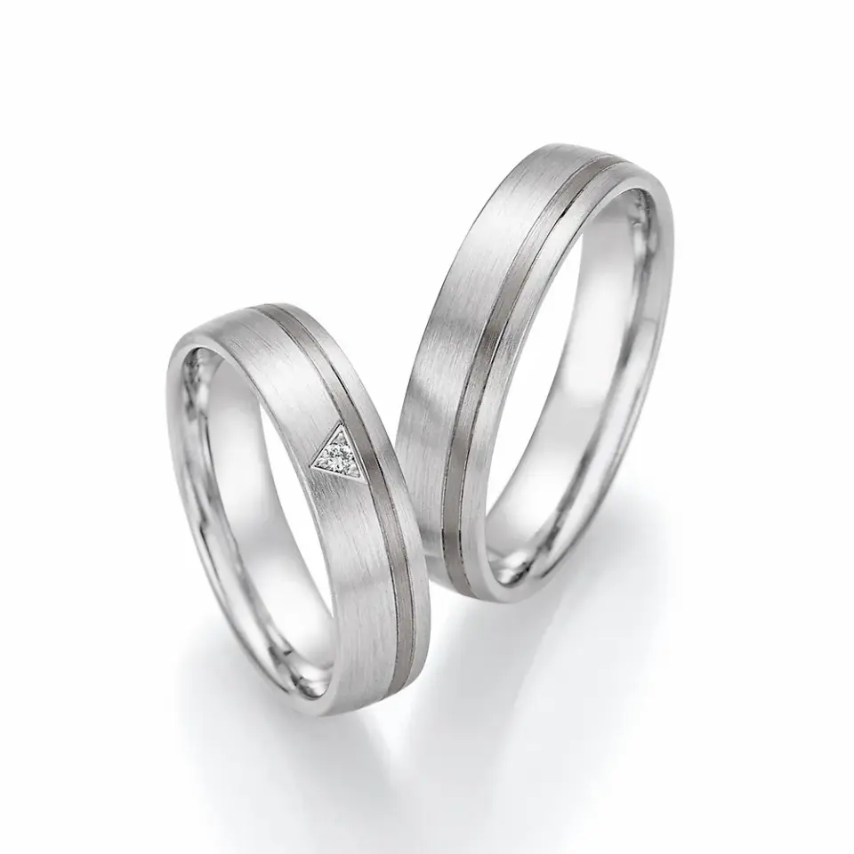 Alianzas de boda de oro blanco y paladio con diamante