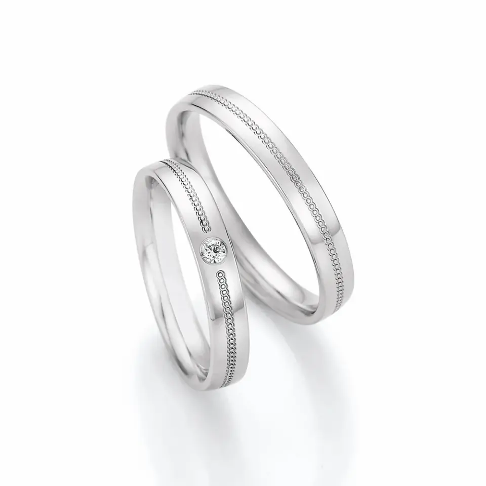 Alianzas de boda de paladio con diamante
