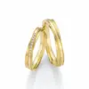 Alianzas de boda de oro amarillo con diamantes