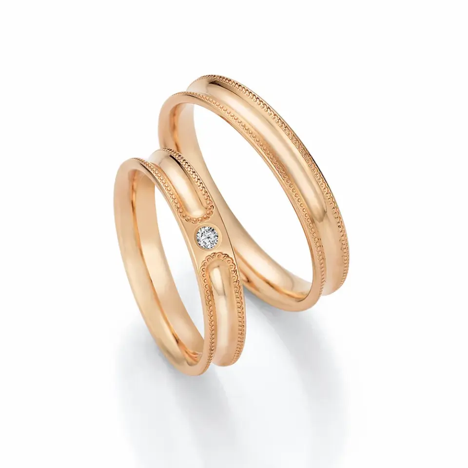 Alianzas de boda de oro rosado con diamante