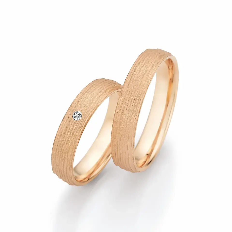 Alianzas de boda de oro rosado con diamante