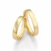 Alianzas de boda de oro amarillo con diamantes
