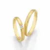 Alianzas de boda de oro amarillo con diamante