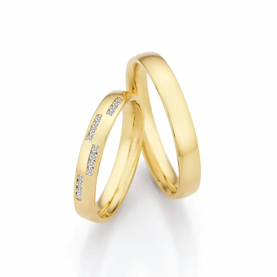 Alianzas de boda de oro amarillo con diamantes