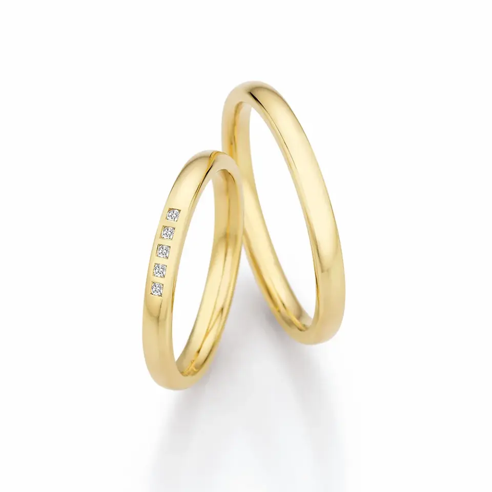 Alianzas de boda de oro amarillo con diamantes