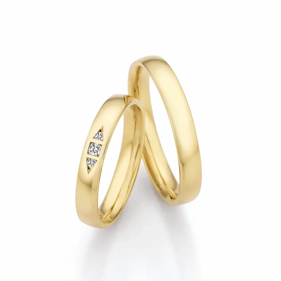 Alianzas de boda de oro amarillo con diamantes