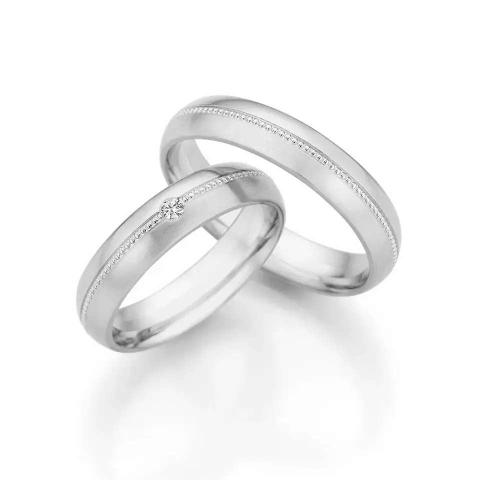 Alianzas de boda de oro blanco con diamante