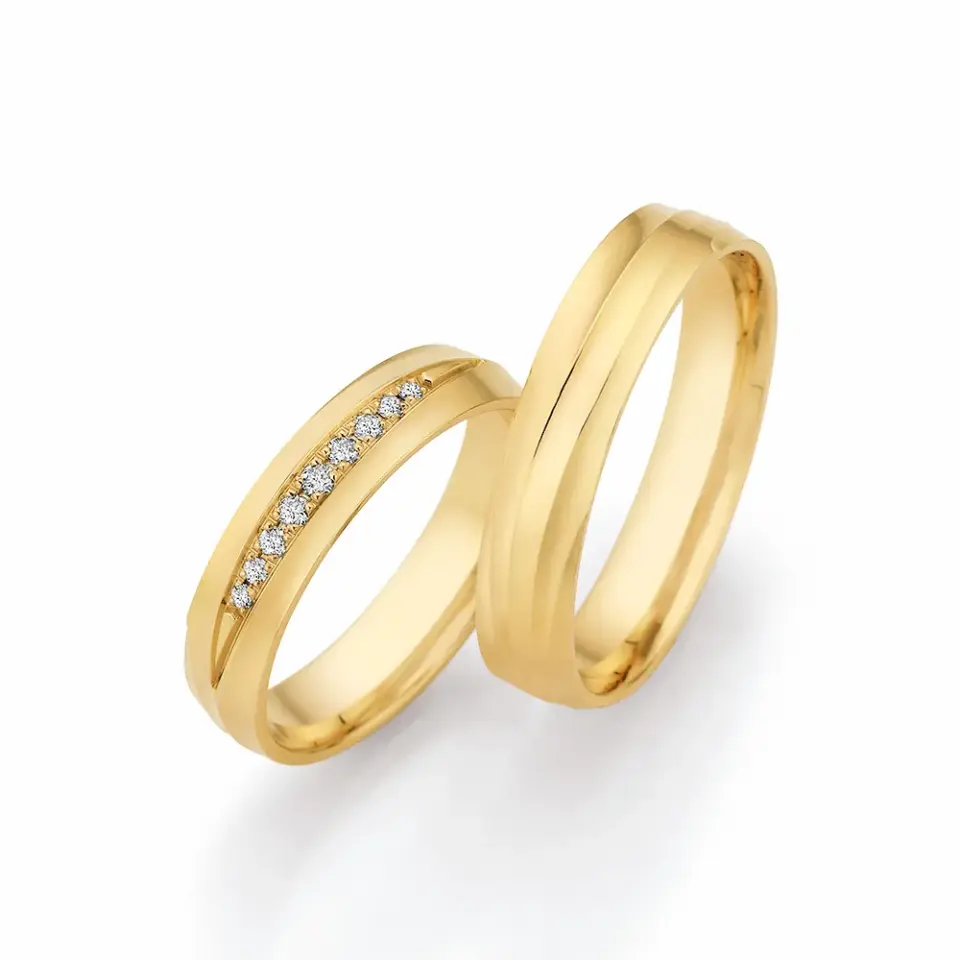 Alianzas de boda de oro amarillo con diamantes
