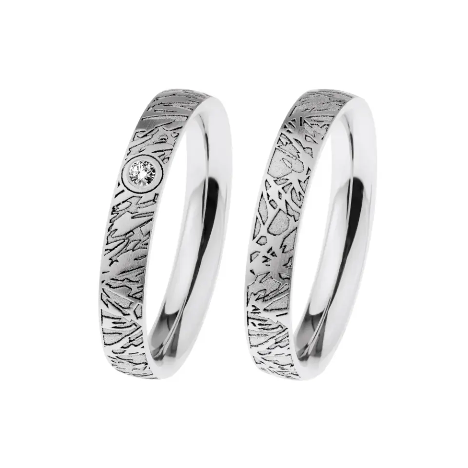 Alianzas de boda de acero con diamante