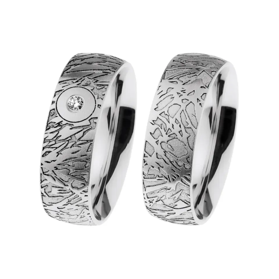 Alianzas de boda de acero con diamante