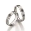 Alianzas de boda de acero y titanio con diamantes