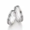 Alianzas de boda de acero y titanio con diamantes