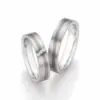 Alianzas de boda de acero y titanio con diamantes